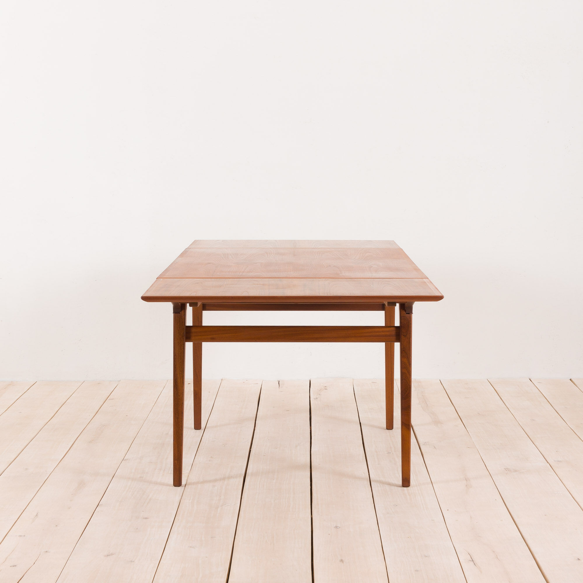Teak extension dining table with concealed panels, Denmark, 60s