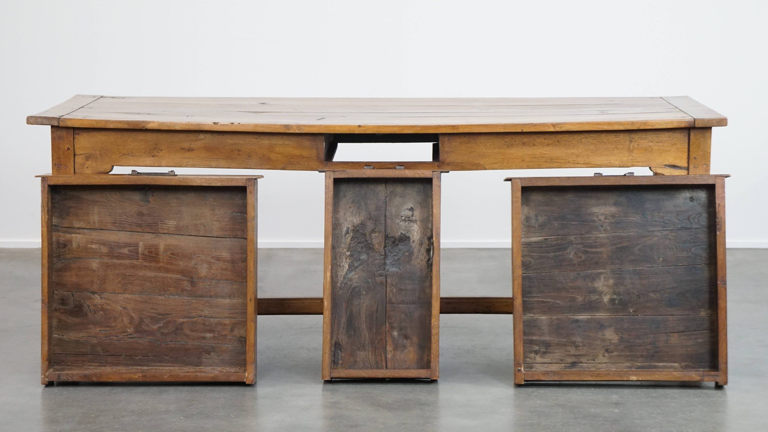 Antique French farmhouse dining table of fruitwood from the 18th century