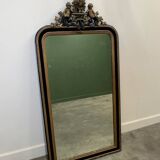 Antique 1800s black and gold mirror with cupid, France 1800s.
