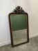Antique 1800s black and gold mirror with cupid, France 1800s.