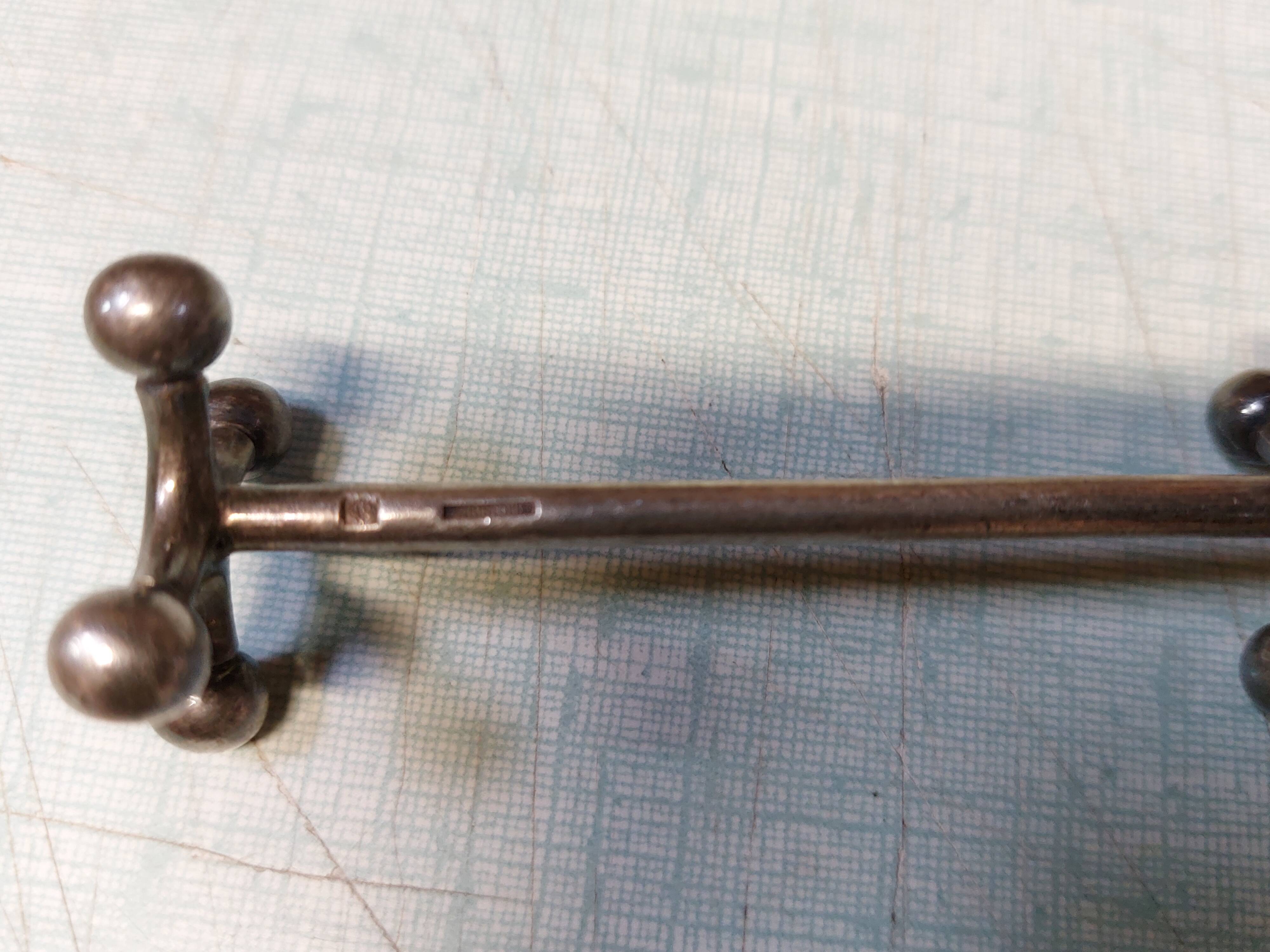 17 Christofle silver-plated knife rests in the Atonium model.