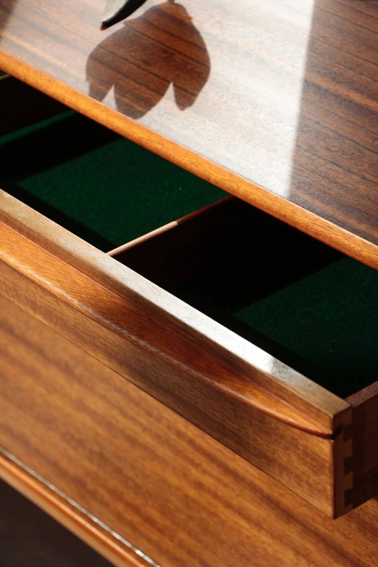 Vintage zebrano and walnut furniture from Morris of Glasgow.