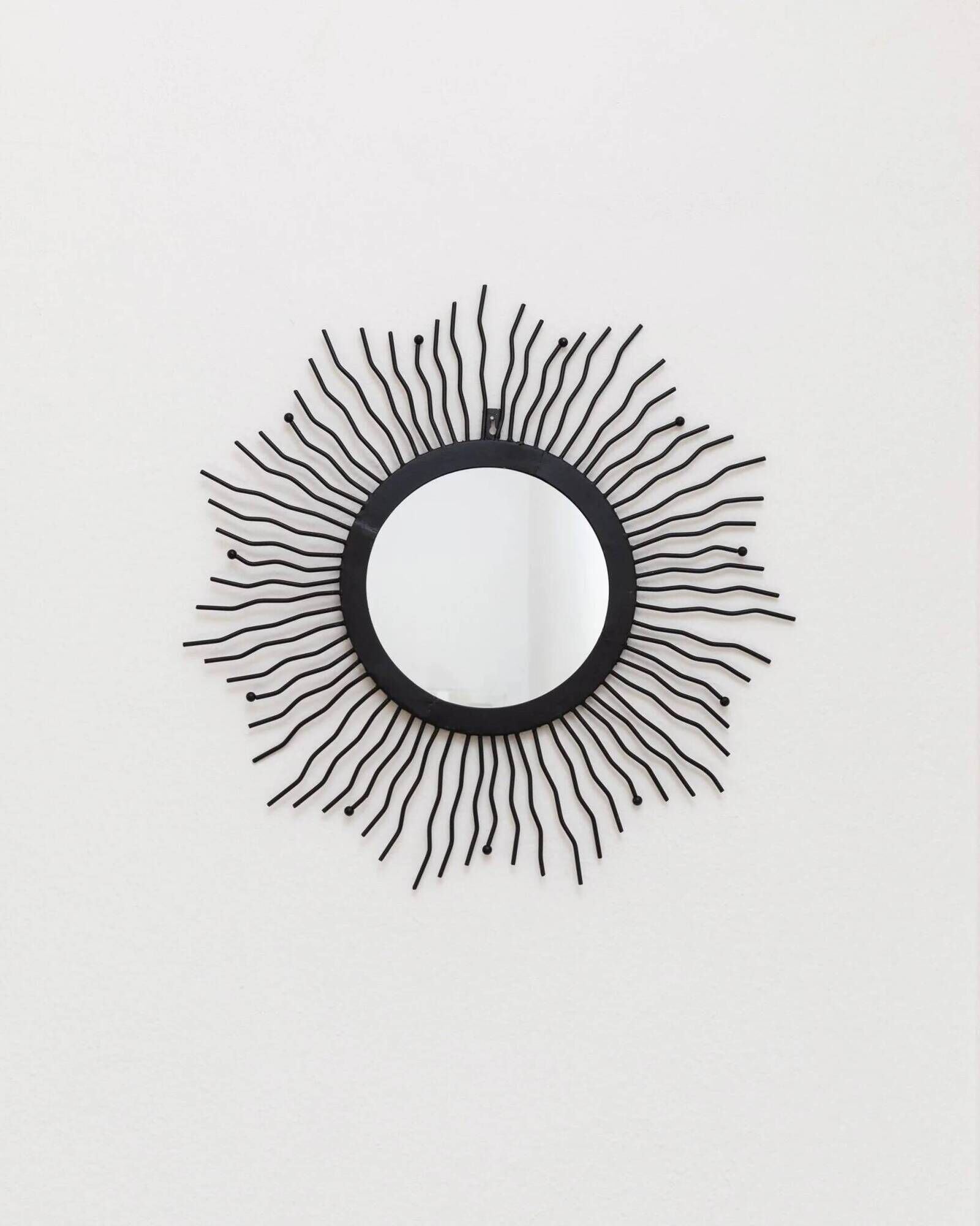 Black metal sunburst wall mirror, round 63x63 cm, vintage 1990s, made in Italy