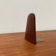 Mid-century Scandinavian bookends in teak and brass.
