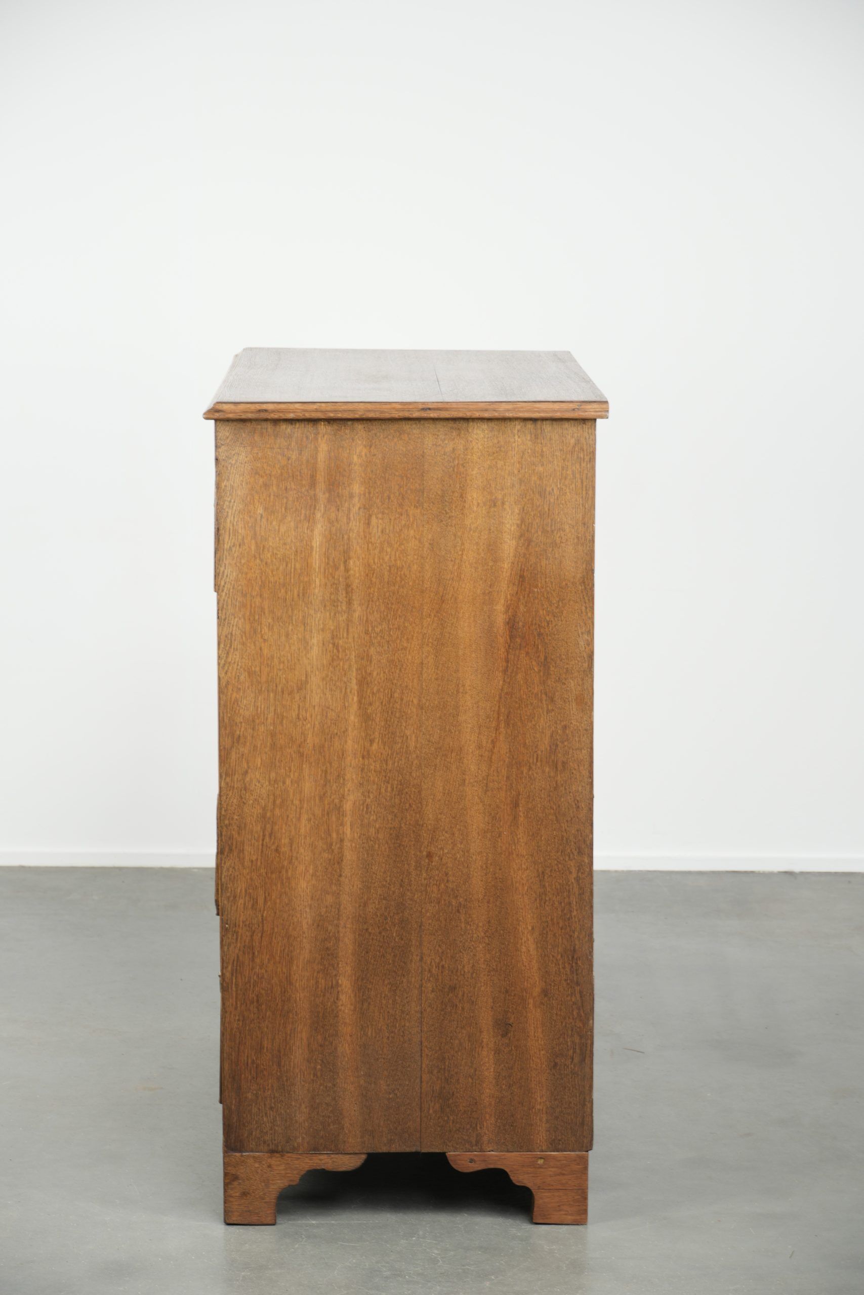Large antique English blonde oak chest of drawers from the 18th century