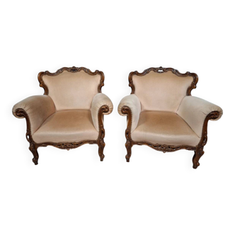 Pair of sculpted walnut armchairs – Louis XV style – 20th century