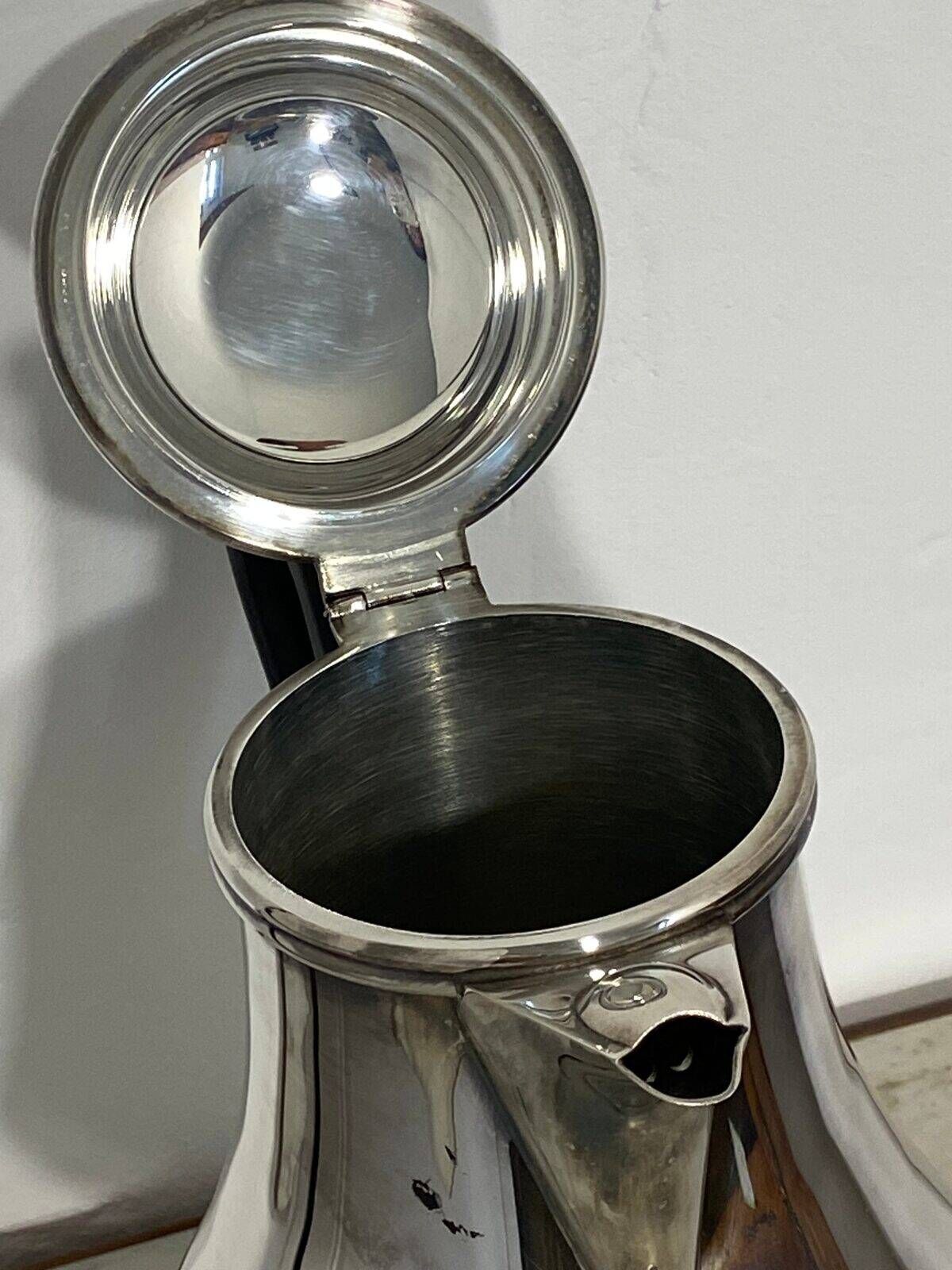 Saint Hilaire teapot in silver-plated metal, with a blackened handle.