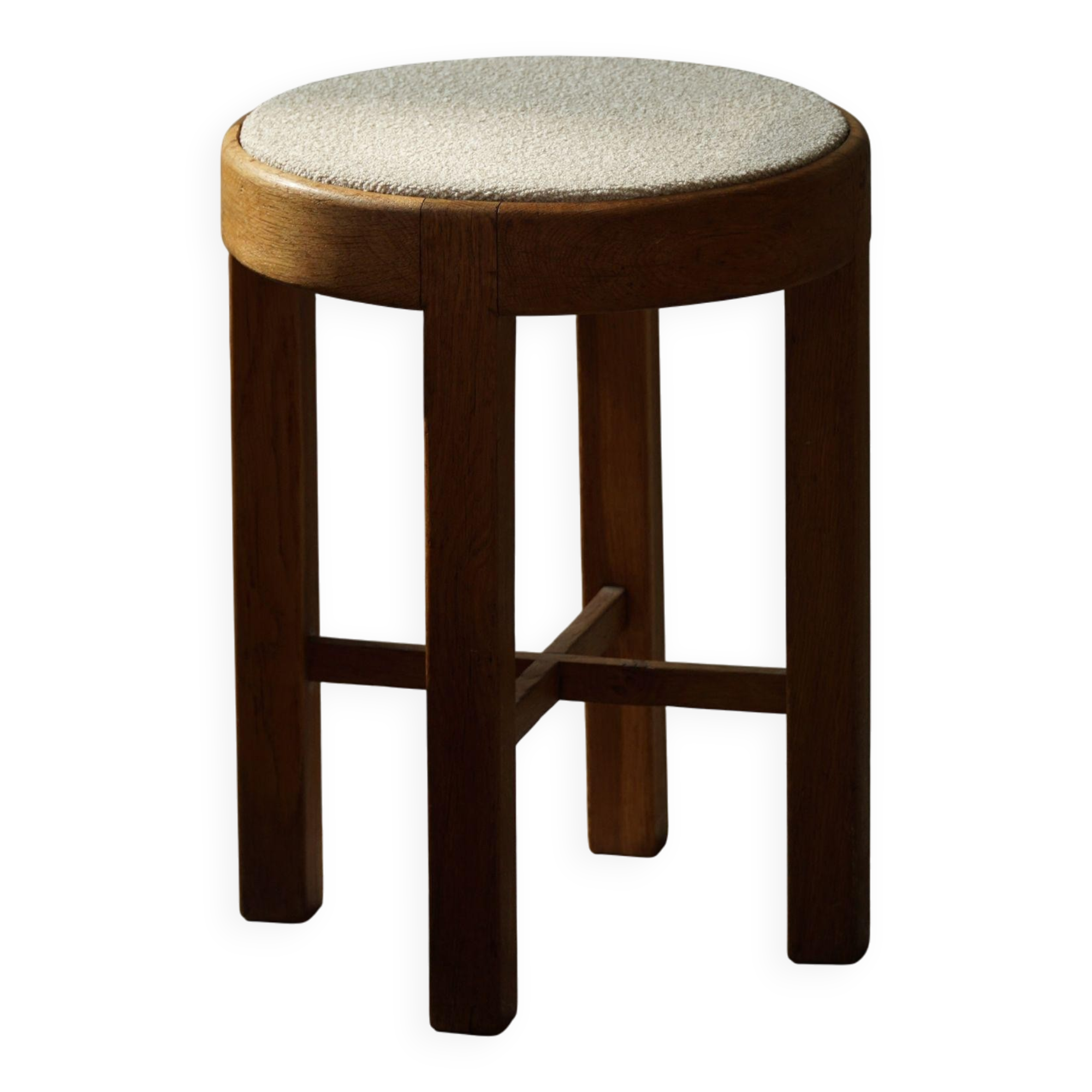 Mid-century Danish stool in oak, reupholstered in boucle wool, circa 1950.