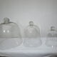 trio of old bells in transparent glass