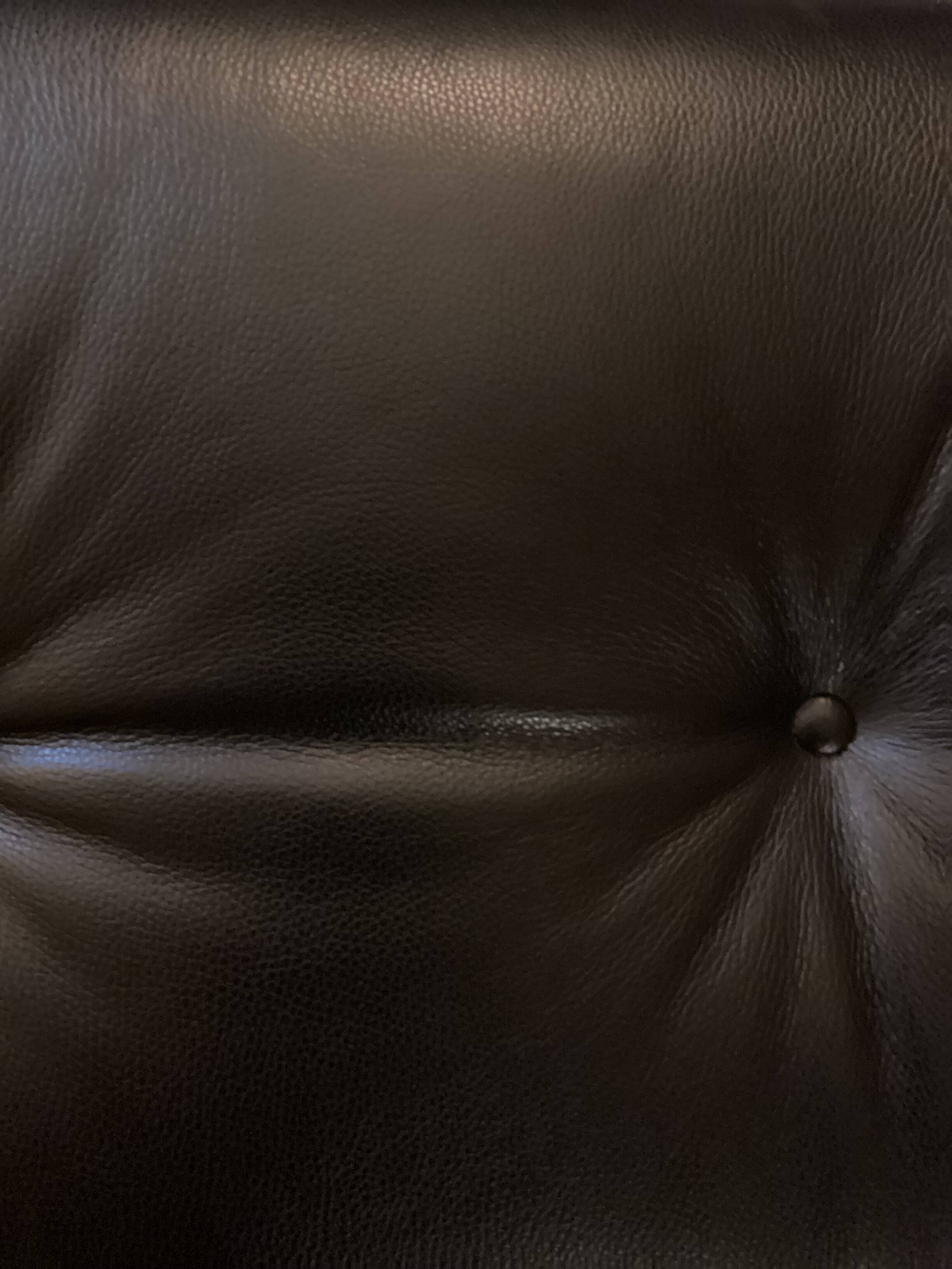 Chair and ottoman by Charles Eames, Herman Miller edition.