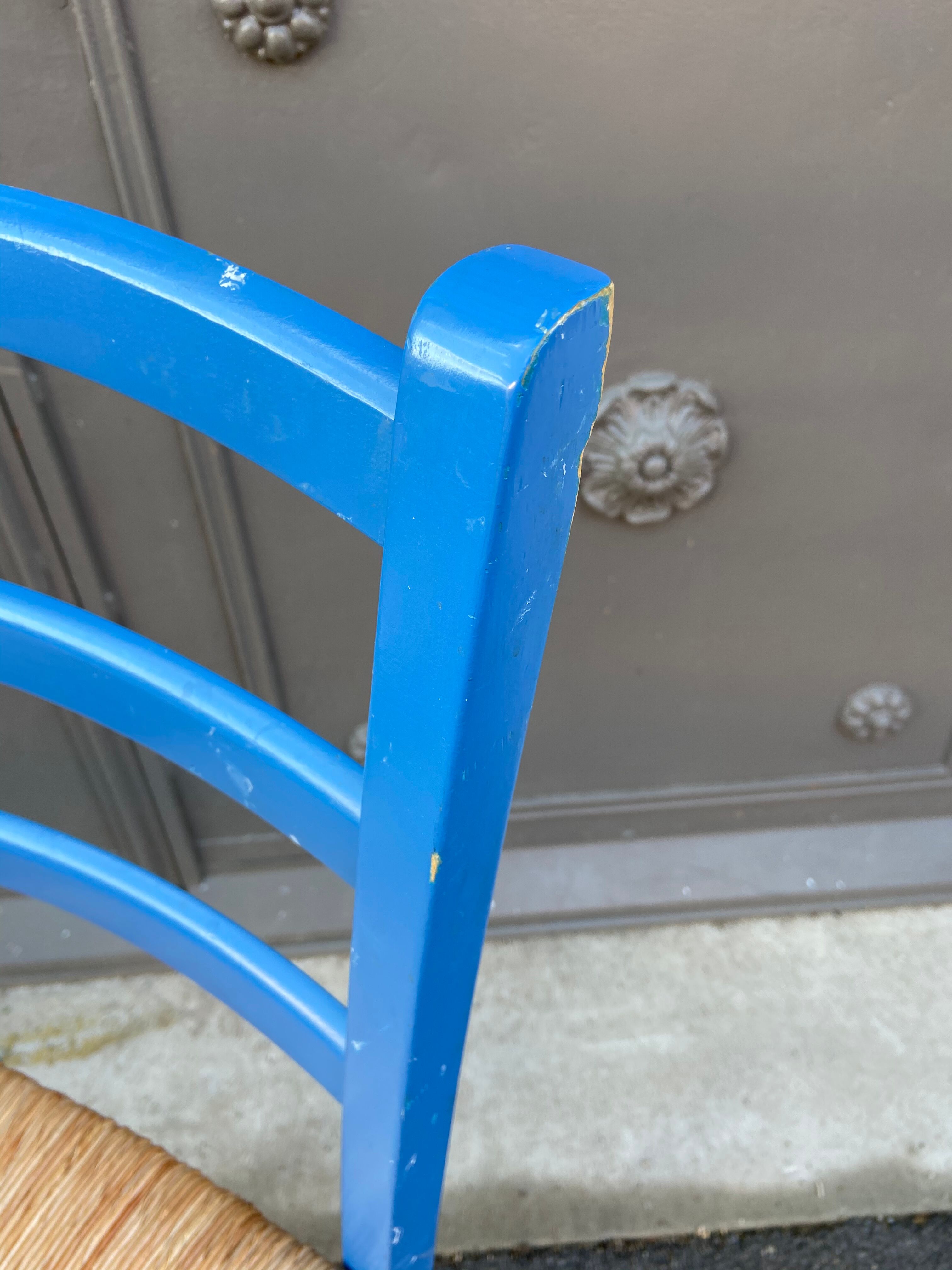 Fake pair of rustic vintage bistro chairs