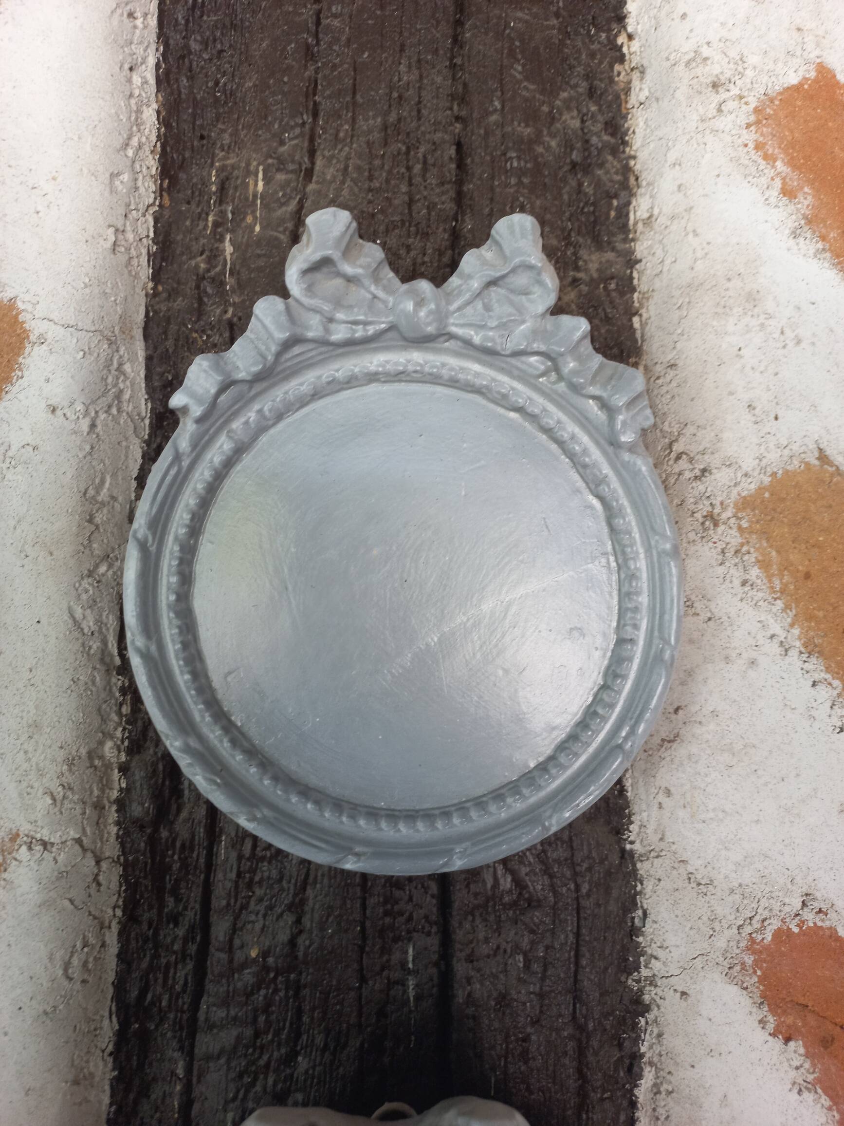 Pair of gray patinated plaster frames