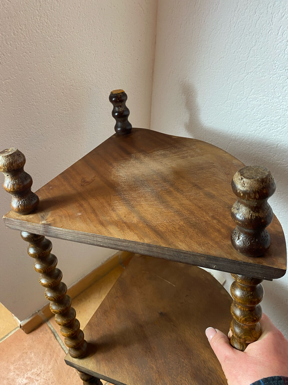 Corner shelf on a turned wooden stand