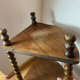 Corner shelf on a turned wooden stand