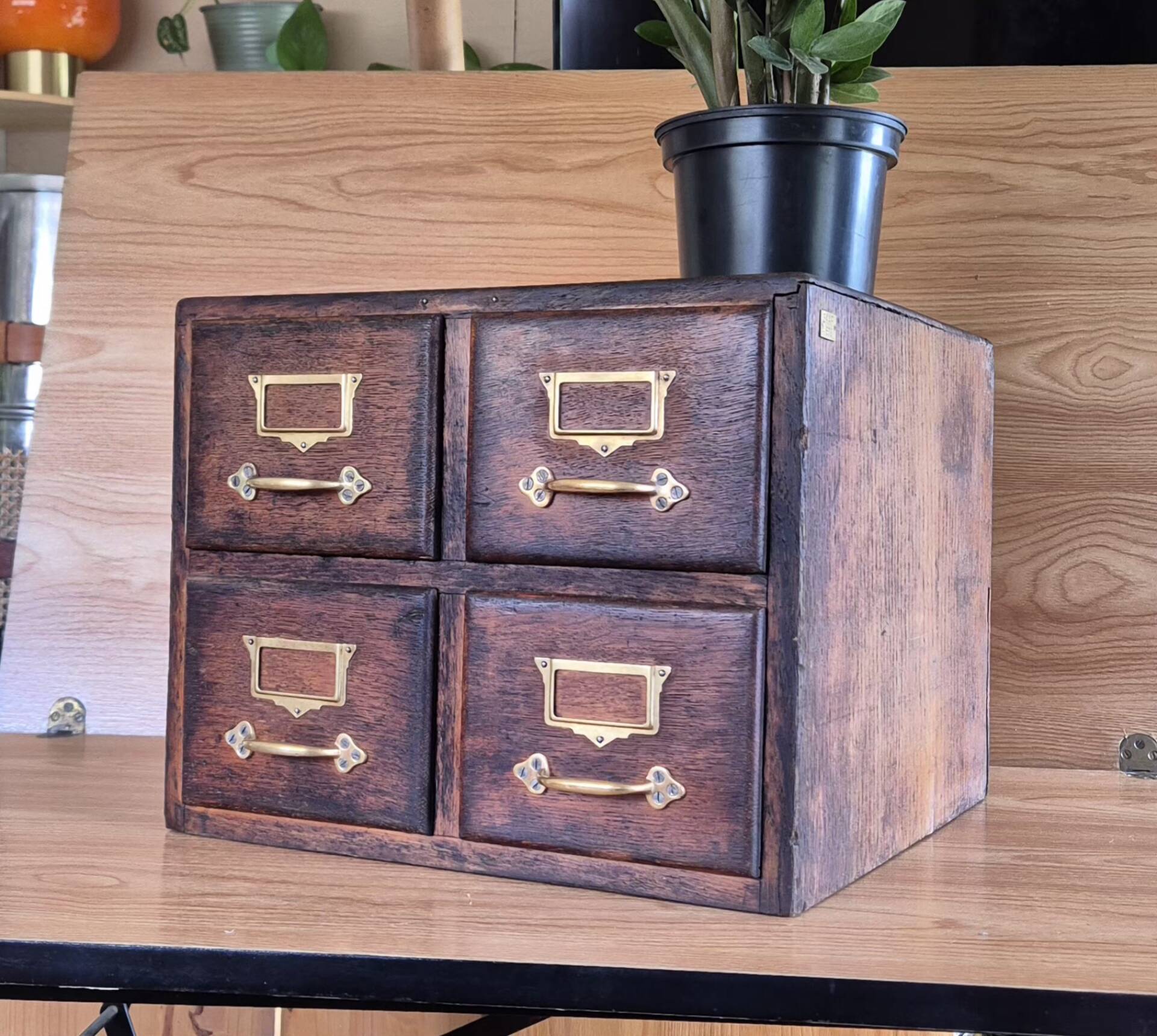 Workshop furniture made of oak and brass.