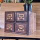 Workshop furniture made of oak and brass.
