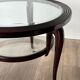 Round mid-century coffee table in walnut with a double top by Paolo Buffa.