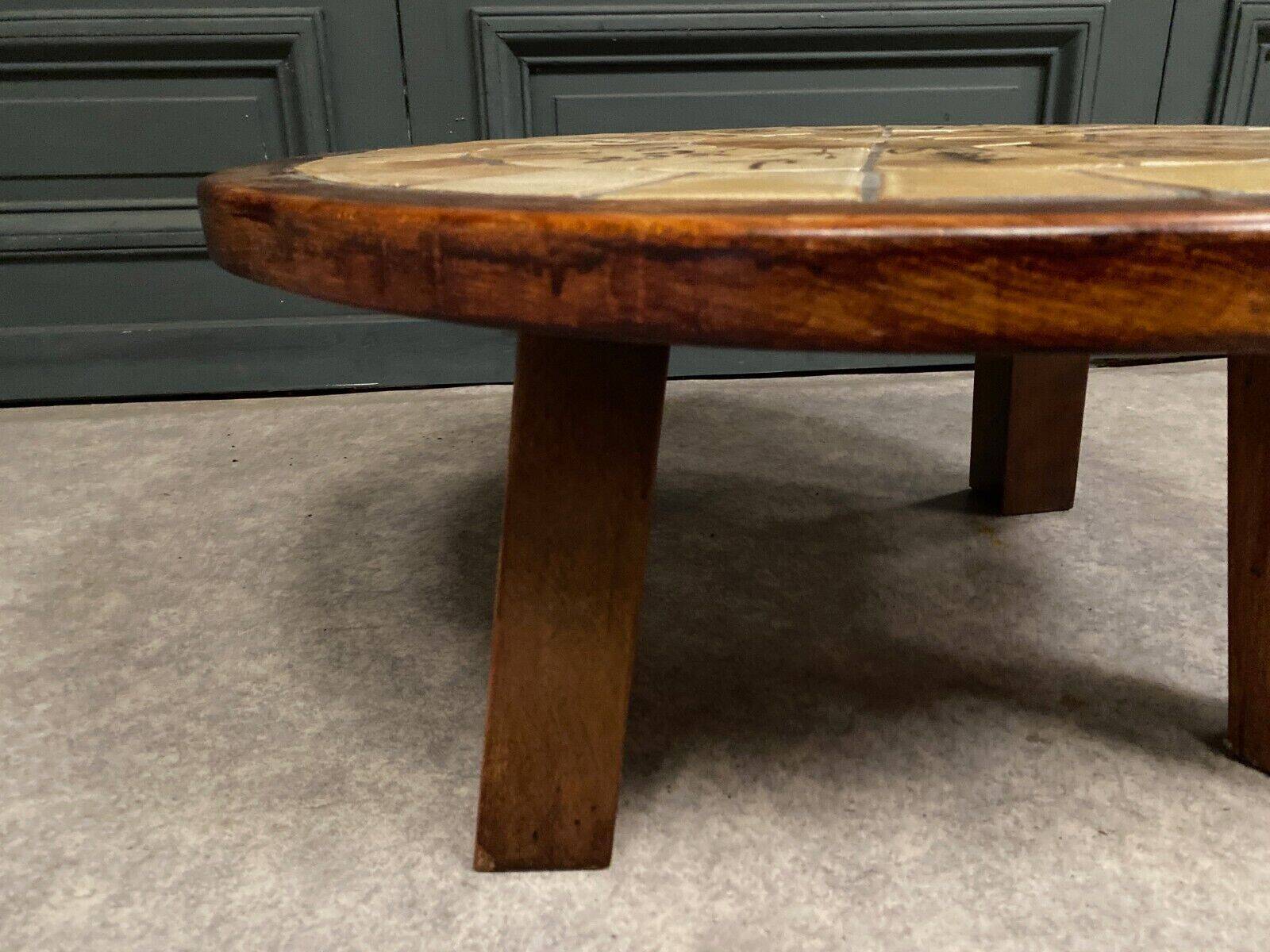 Brutalist ceramic and wood coffee table in the style of Roger Capron