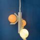 Mid-century white suspension with a bony design and opaline glass shade.
