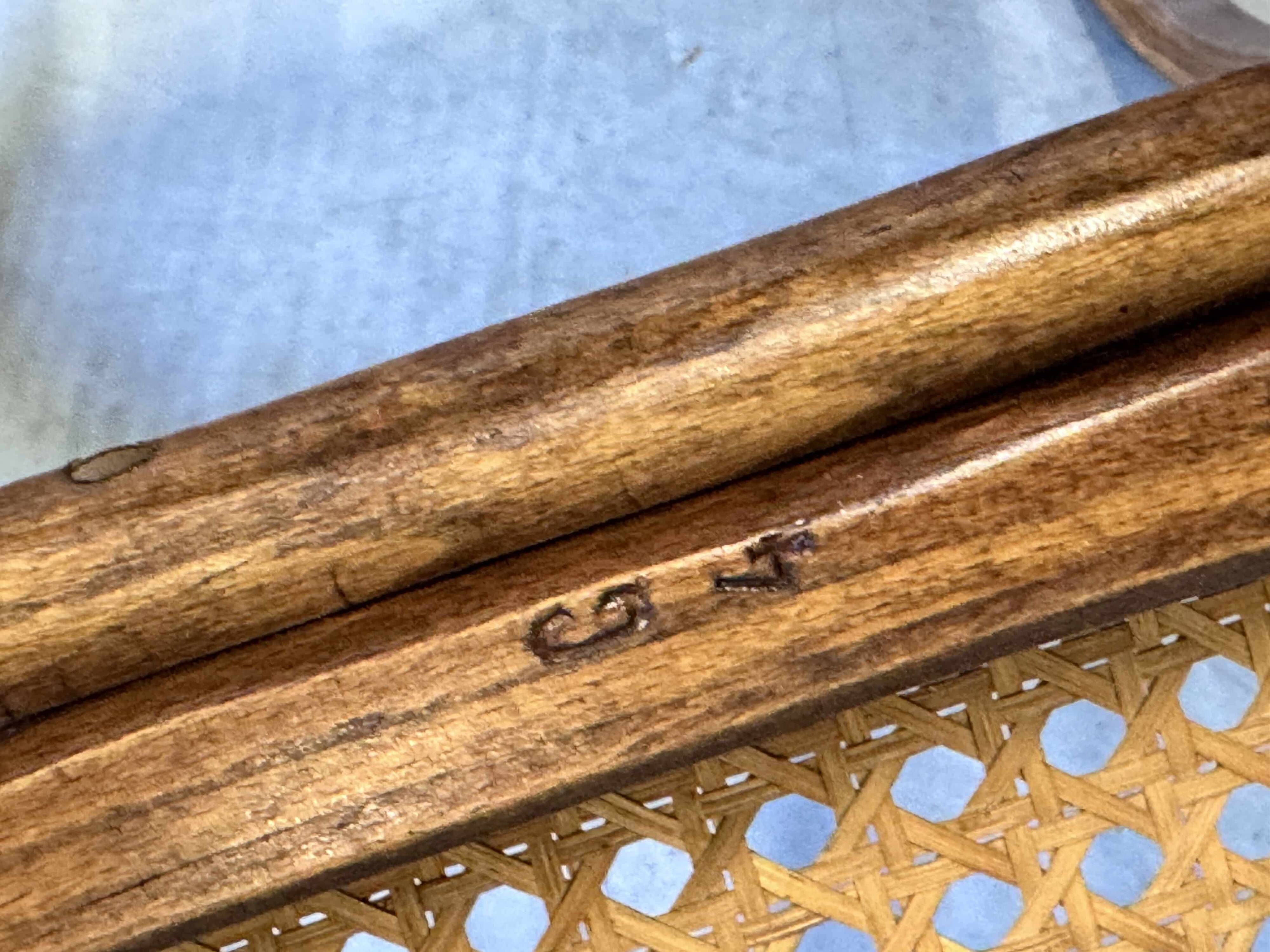 Rocking chair Thonet en bois courbé et cannage