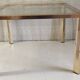 Gold metal and glass coffee table - 70s/80s