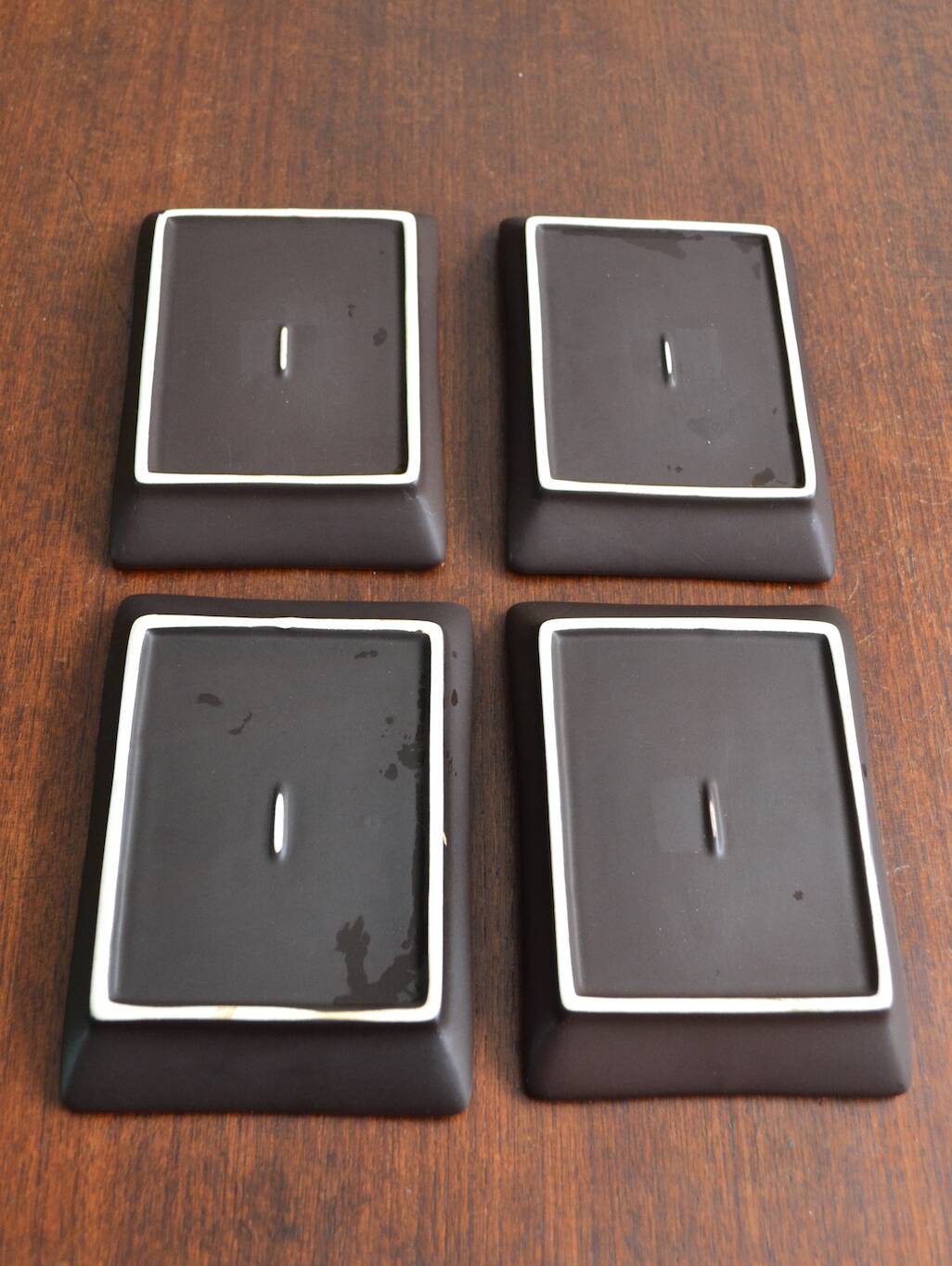 4 rectangular enameled ceramic cups