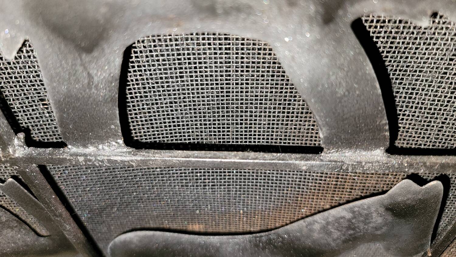 Black metal firewall decorated with animals