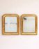 Set of two small French Louis-Philippe gilt red mirrors from the 19th century.