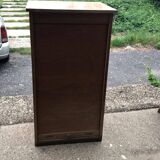 Brown lacquered wooden industrial cabinet with sliding curtain, 1950s, Czech Republic.