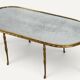 Maison Baguès coffee table in gilded bronze and aged mirror – 1950s