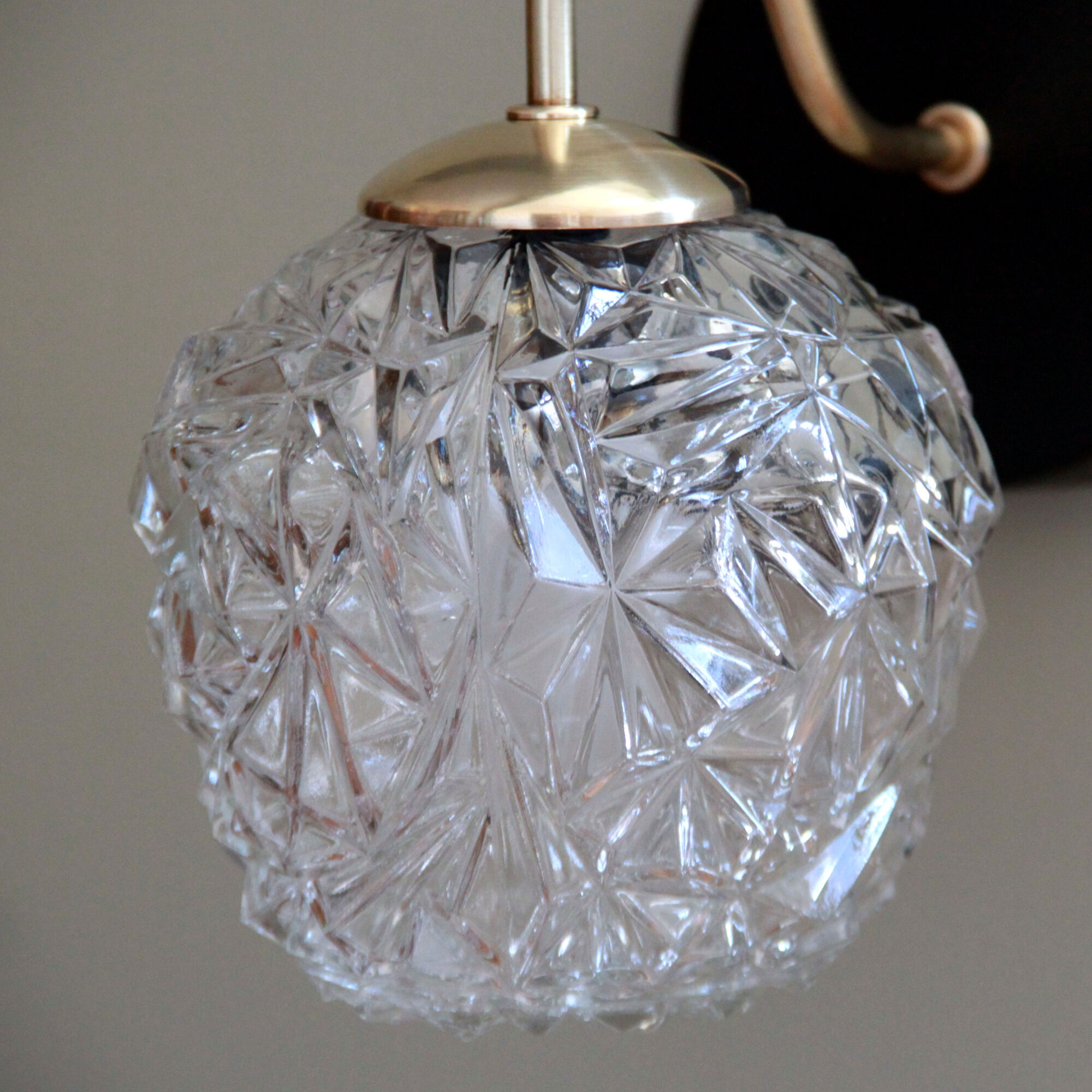 Pair of brass wall sconces and thick glass globe vintage luminaire