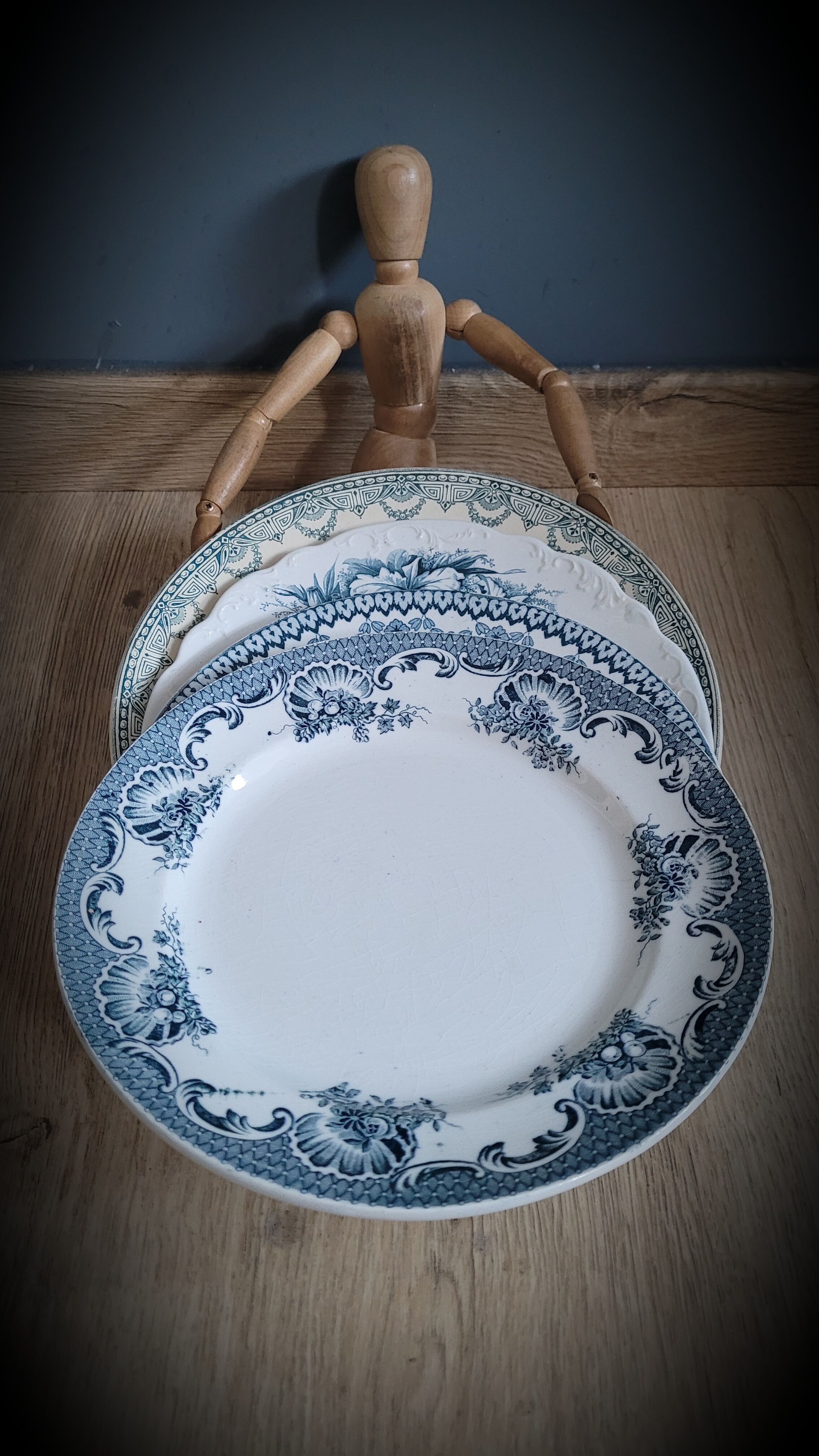 Quartet of mismatched blue plates