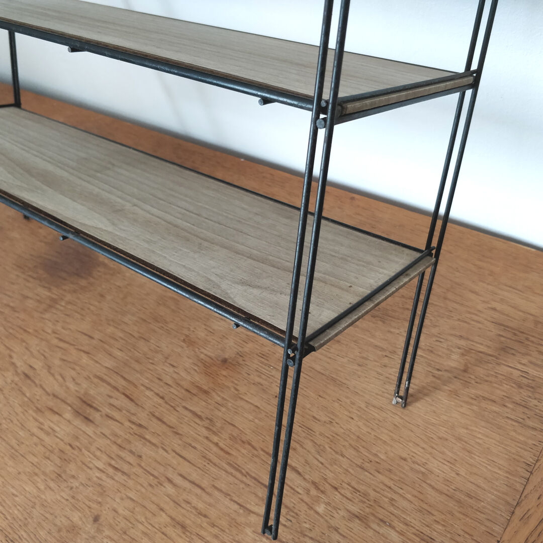 Metal wall thong shelf