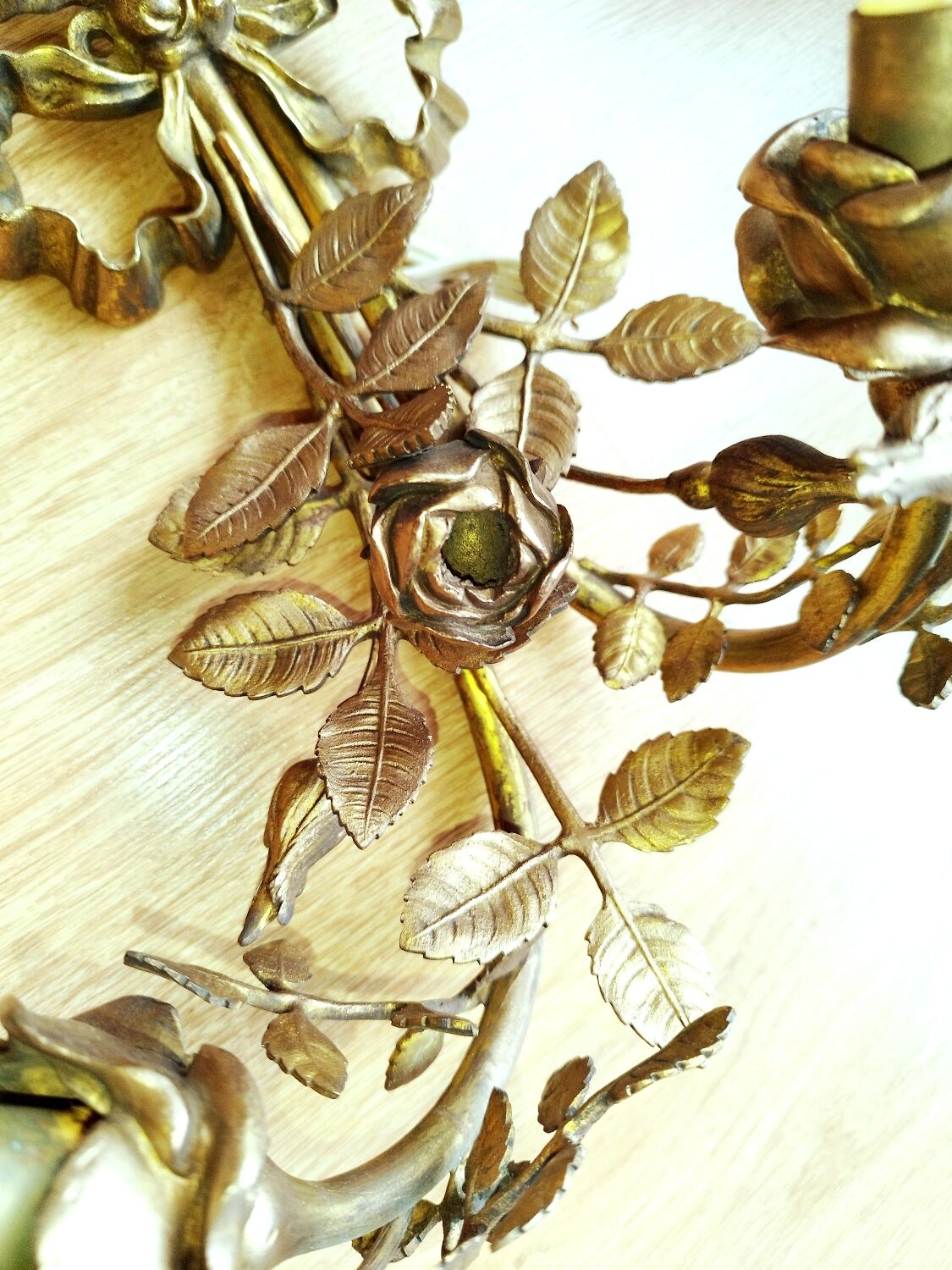 Pair of bronze and gilded metal wall sconces in the Louis XVI style.