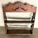 Carved wooden shelf