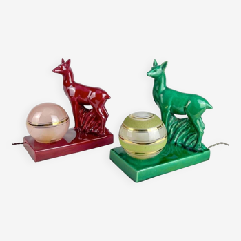 Duo of deer night lights in slip and glass globes from the 50s