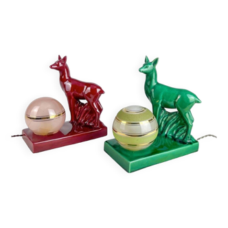 Duo of deer night lights in slip and glass globes from the 50s