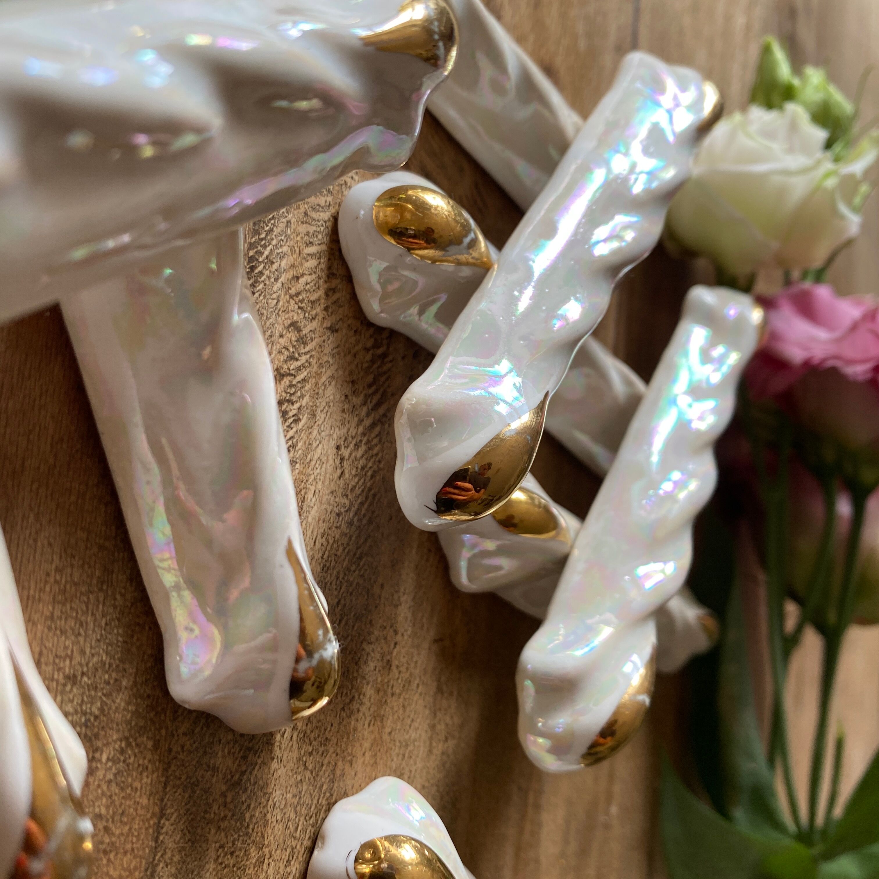 Set of 9 vintage art deco knife holders in pearly and gold ceramic