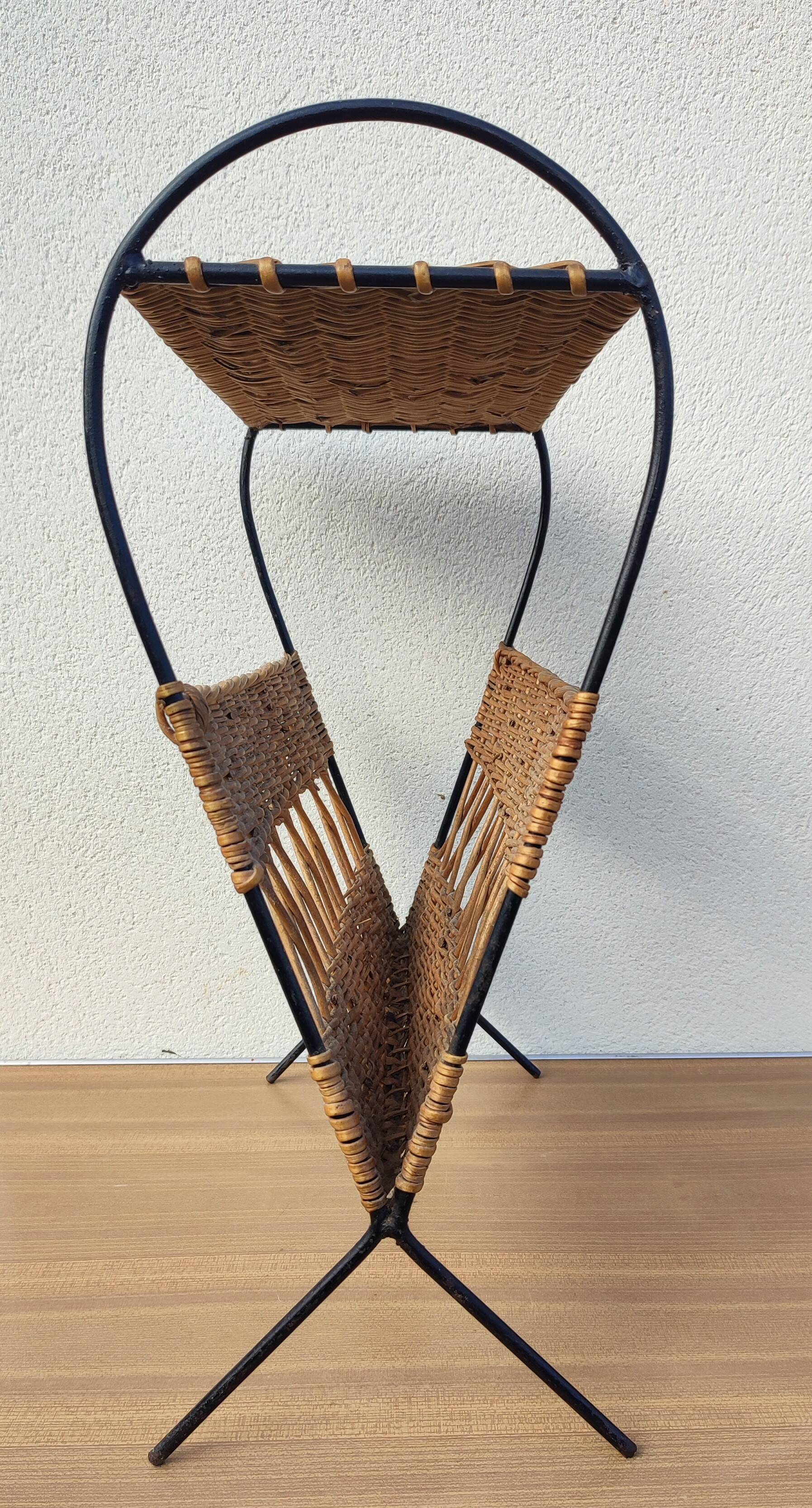 Antique magazine rack made of iron and woven rattan wicker