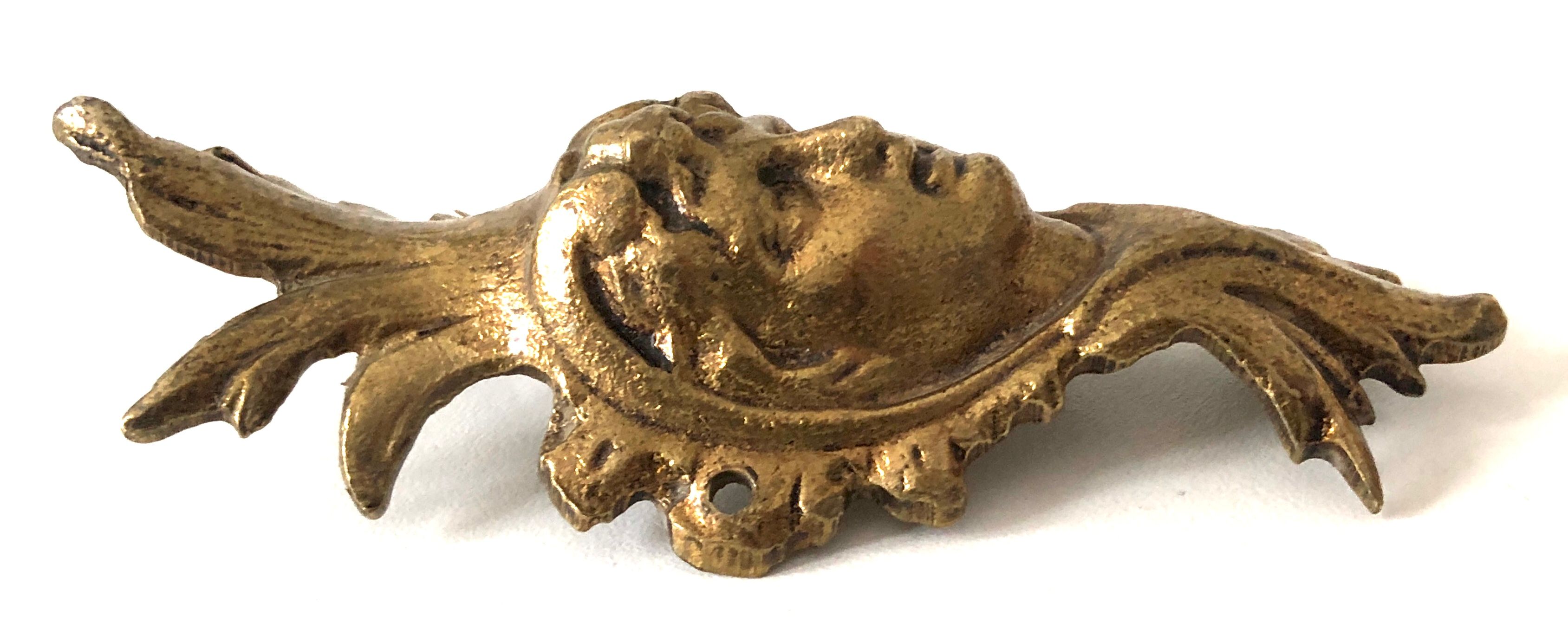 Figurative decoration in metal