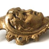 Figurative decoration in metal