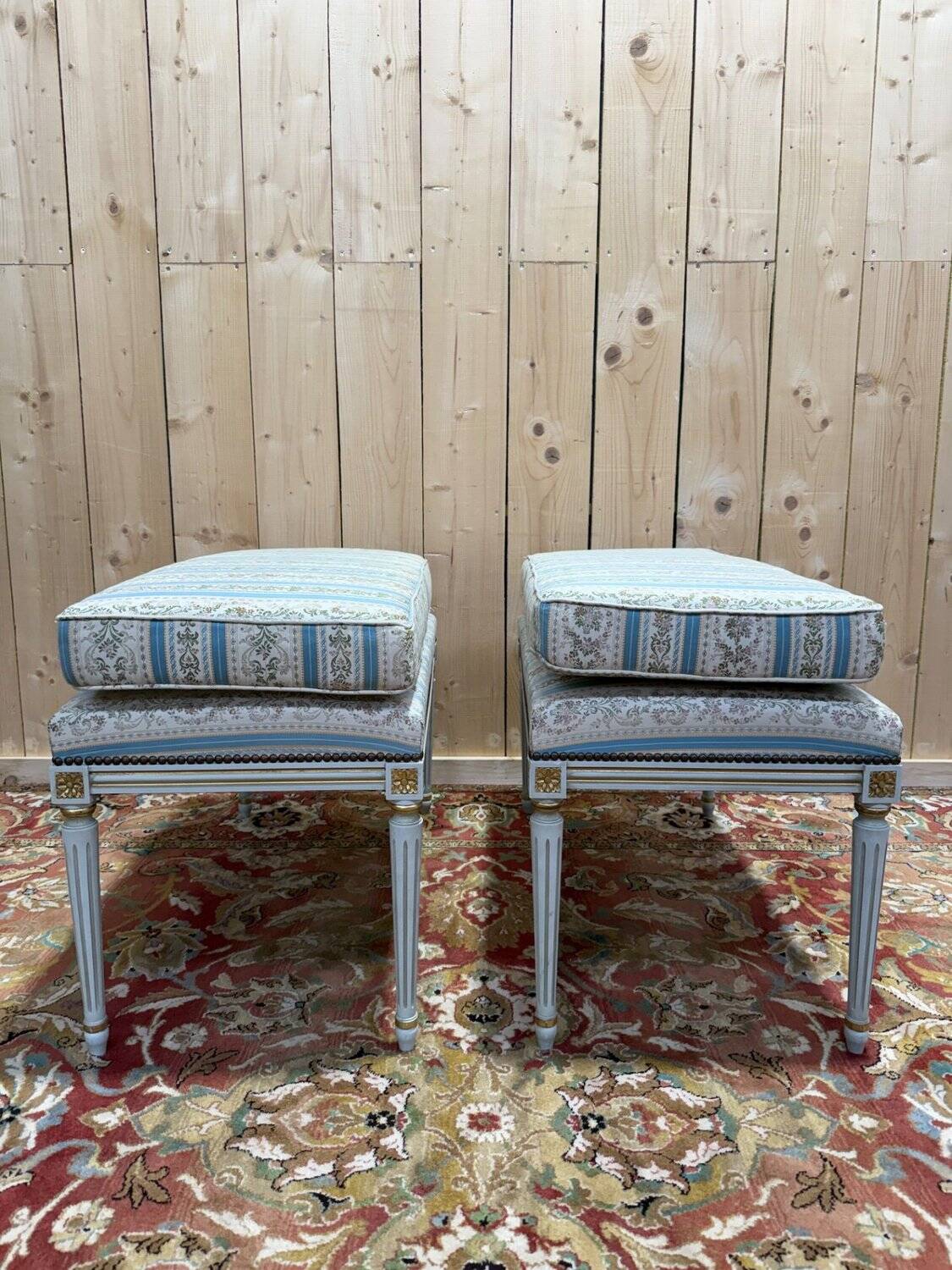 Pair of Louis XVI benches in lacquered and gilded wood