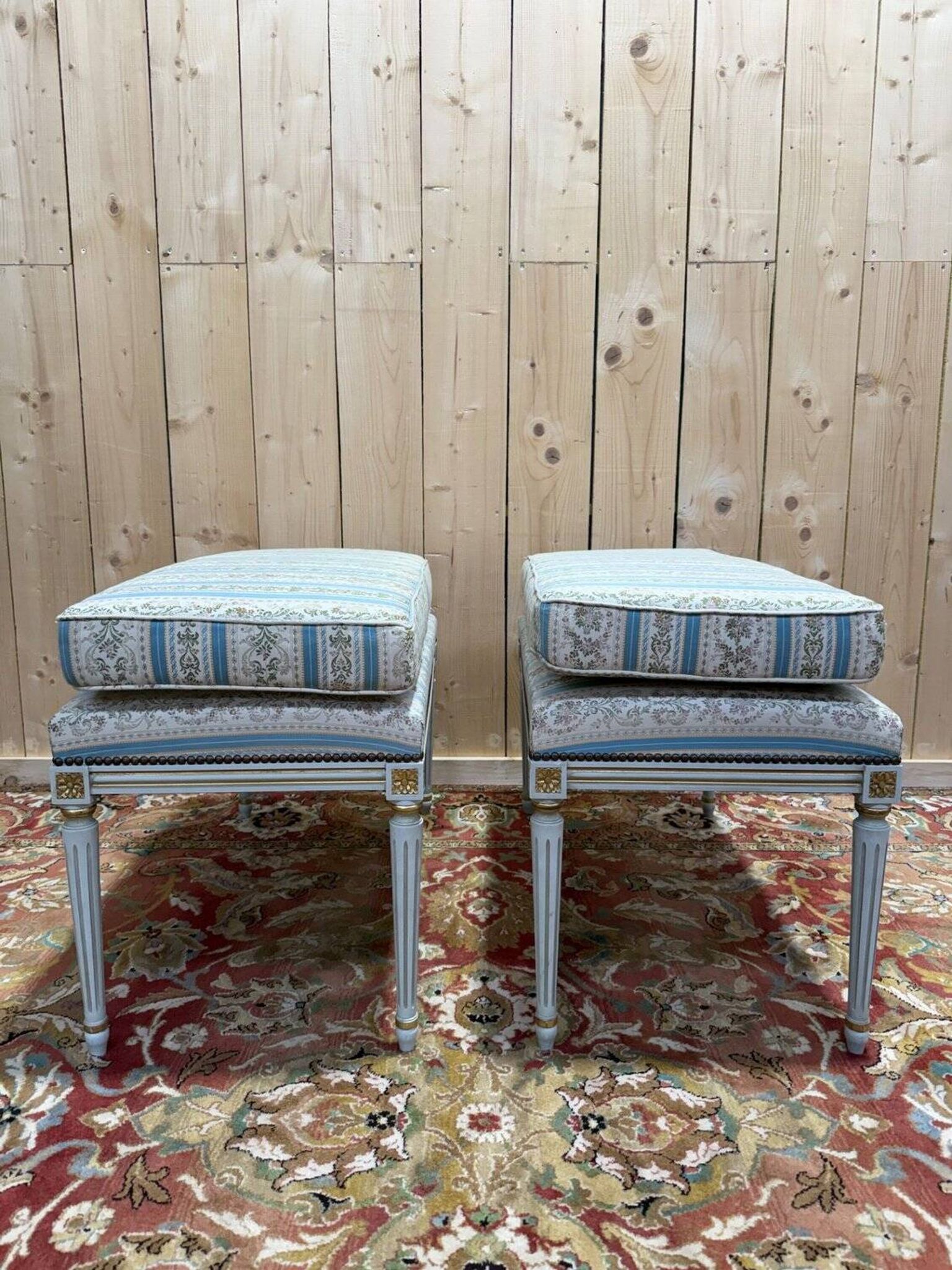 Pair of Louis XVI benches in lacquered and gilded wood