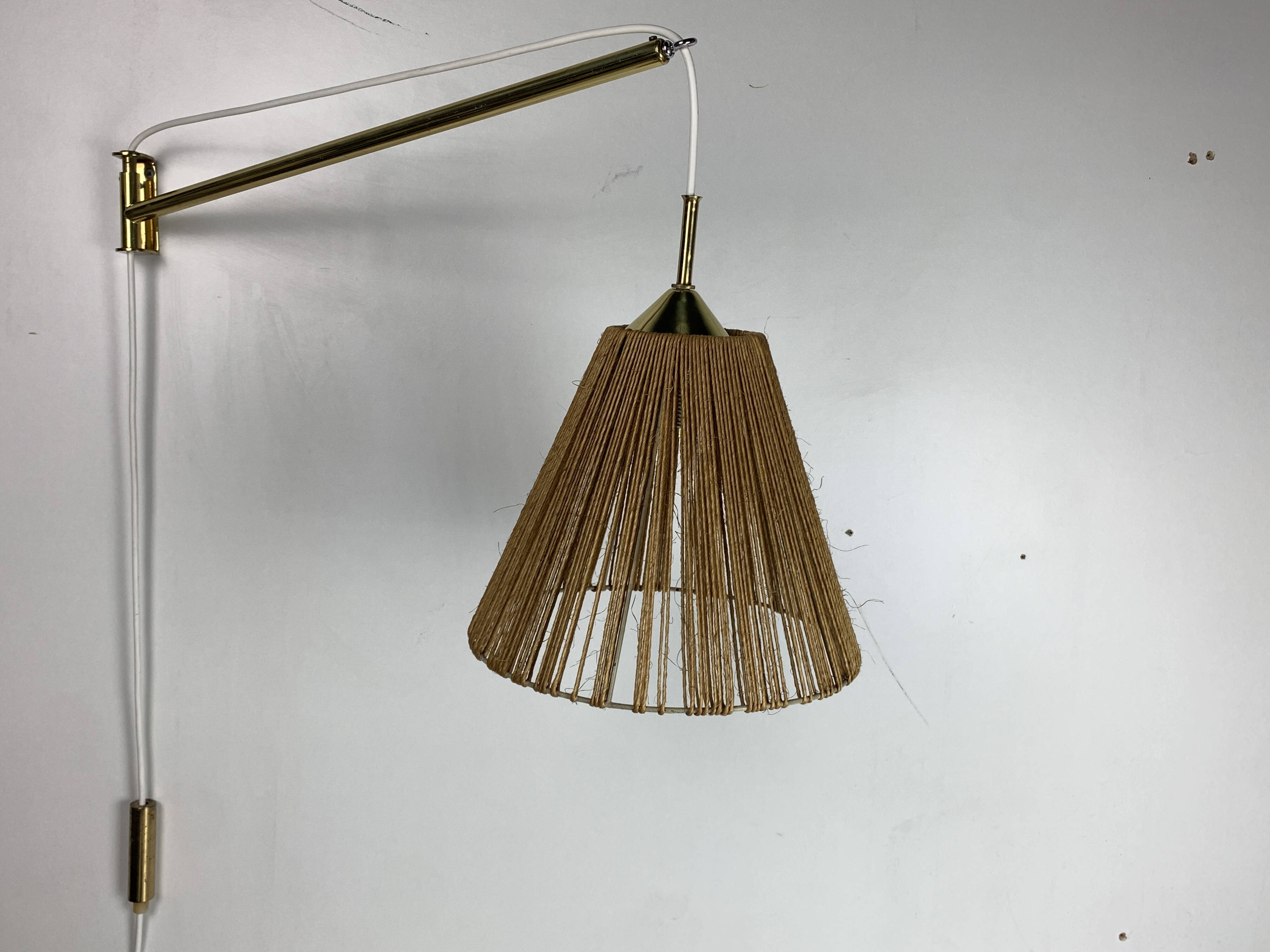 Midcentury extendable brass wall mount with cocoon and sisal shade Lars Schioler, 1960s