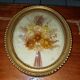 Oval frame domed dried flowers occasion