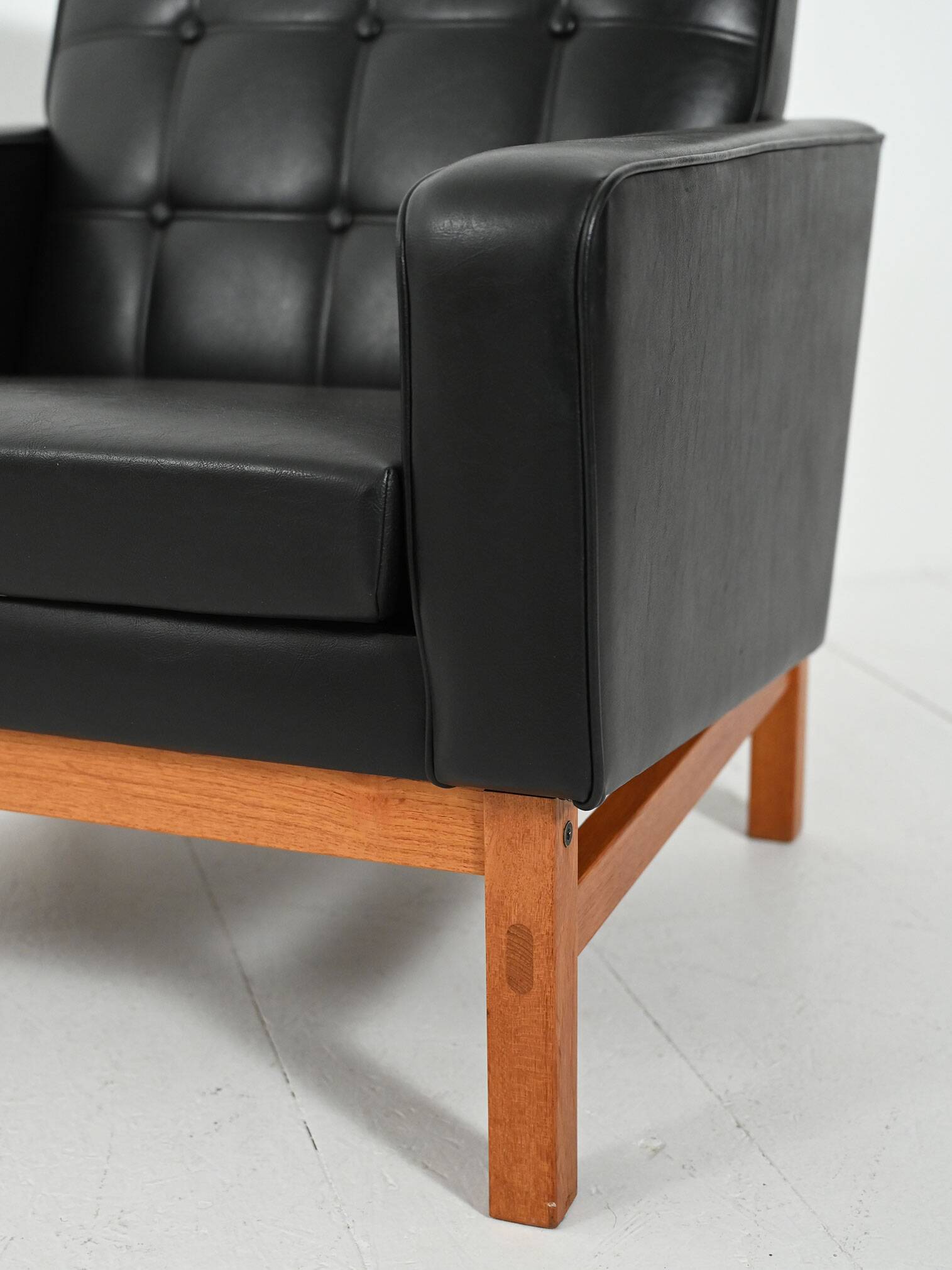 Swedish AB Futura teak and faux leather armchair