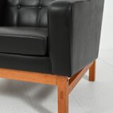 Swedish AB Futura teak and faux leather armchair