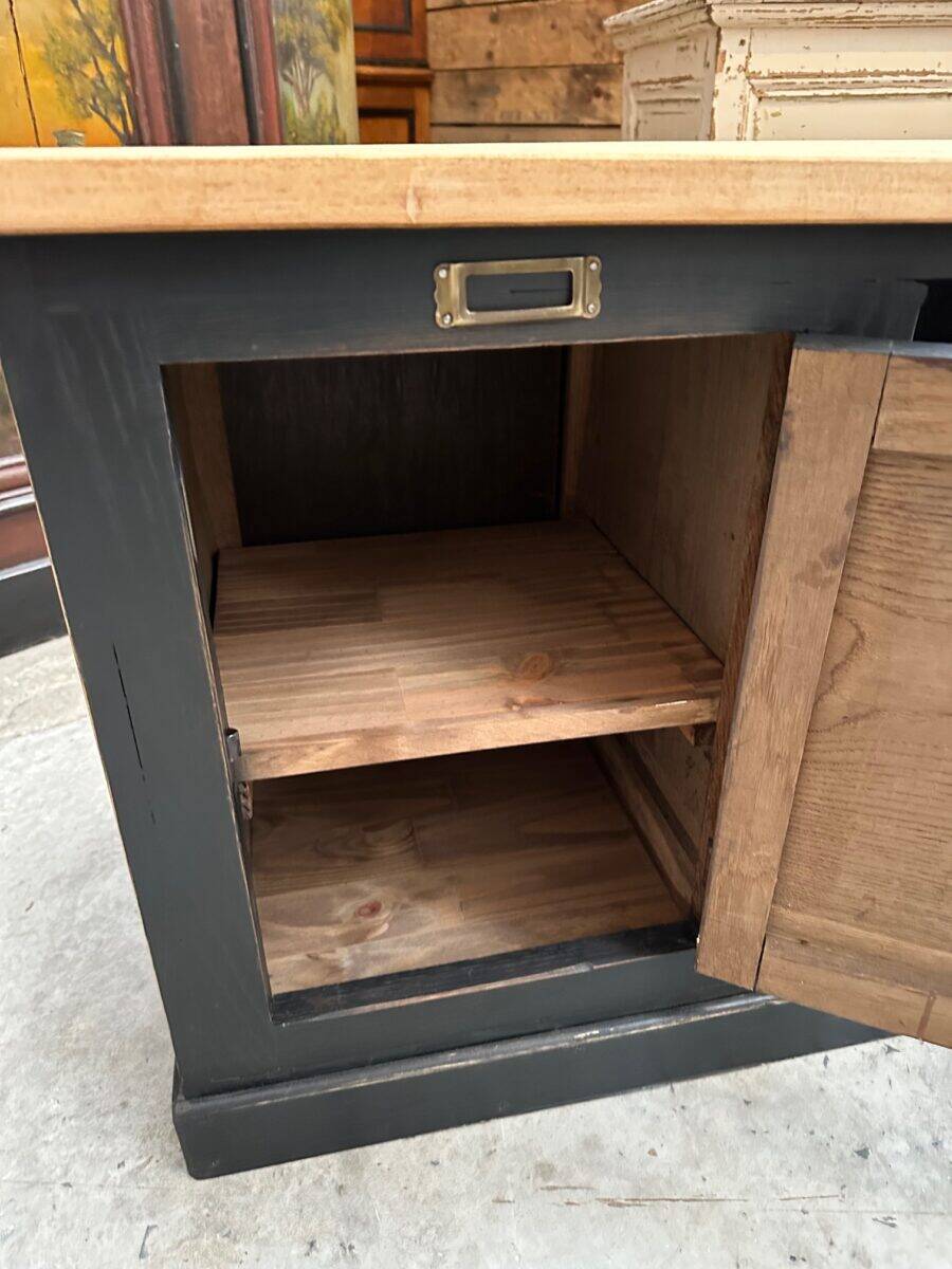 Old workshop furniture transformed into a TV unit.