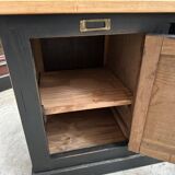 Old workshop furniture transformed into a TV unit.