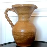 Sandstone jug with twisted handle